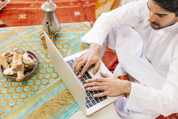 a man learning Quran online via Zoom